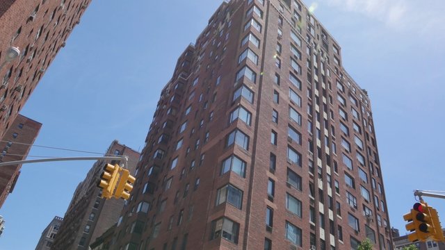 Tilt Up Typical Manhattan Style Apartment Building Establishing Shot