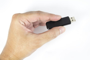 hand holding flash drive isolated on white background