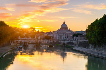 Fototapeta na wymiar Sunset view of Basilica St Peter and river Tiber in Rome. Italy 
