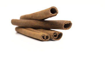 Cinnamon on the white background