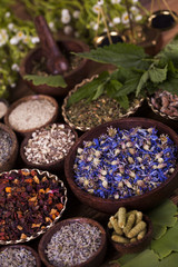 Natural medicine, wooden table background