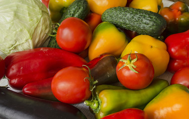Vegetable harvest, top view. Cucumber, tomato, pepper, cabbage, paprika, eggplant. Background of natural food close-up. Eco products from the market. Healthy nutrition, diet menu.