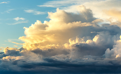 Sunset on blue sky background