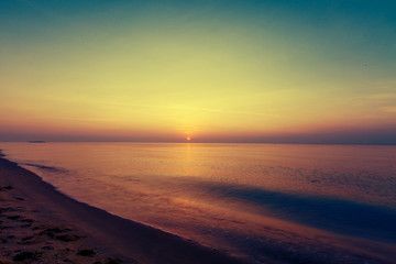 Fototapeta premium Sunrise over tropical sea and beach in Thailand
