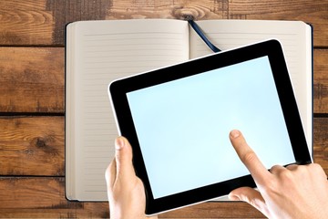 Holding tablet. © BillionPhotos.com