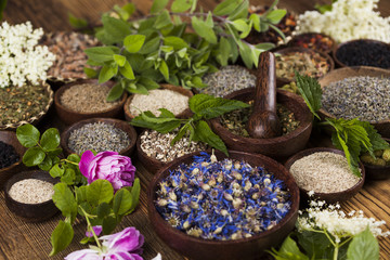 Natural remedy,Herbal medicine and wooden table background