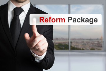 businessman pushing flat button reform package