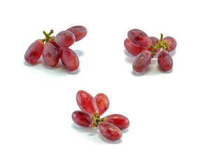 Fototapeta na wymiar Red grape isolated on white background