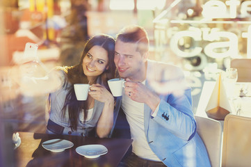 Young couple in cafe