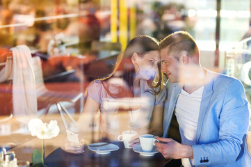 Young couple in cafe