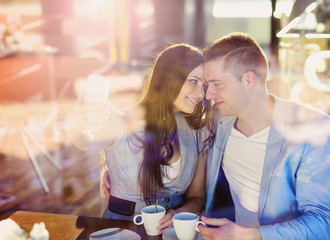 Young couple in cafe