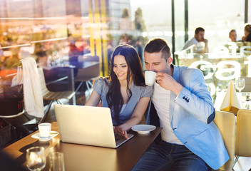Fototapeta premium Young couple in cafe