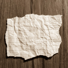 Obraz premium Blank notepaper on wood background