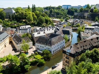 Fototapeta na wymiar Aerial view of the Grund district of Luxembourg City and Alzette river
