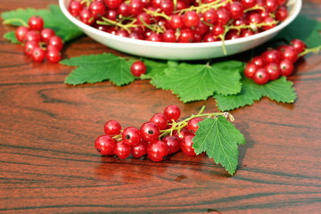 Fresh red currant on table close up