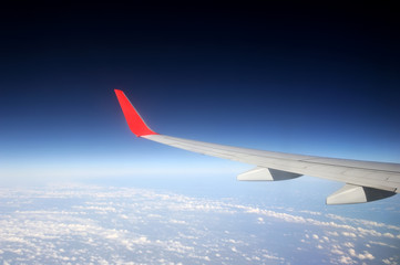 Fototapeta na wymiar Image through aircraft window