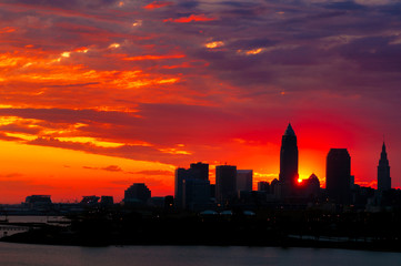 Fototapeta na wymiar Cleveland, Ohio, silhouetted by a brilliant sunrise