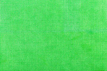 Green fabric background.