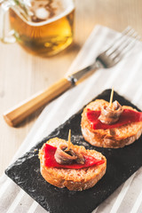 Anchovies with beer jar