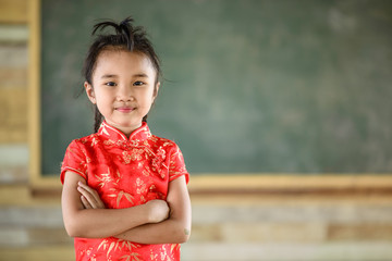 Little girl on red Chinese dress