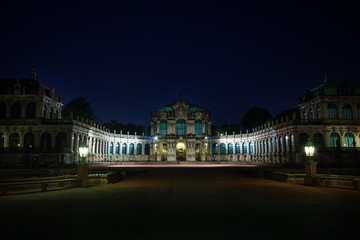 Fototapeta na wymiar Panorama of art gallery illuminated at night 