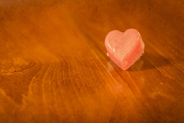 Love valentine heart on wood background