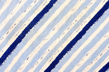 Navy blue striped background. Blue and white stripes pattern on fabric.