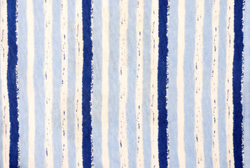Navy blue striped background. Blue and white stripes pattern on fabric.