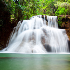 Fototapeta na wymiar Beautiful waterfall in deep forest.