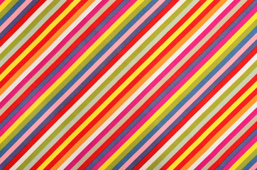 Colorful striped background. All colors diagonal stripes pattern on fabric. - 90863928