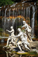 Fototapeta na wymiar The baroque residence of Caserta in Italy, the lake, the statues.