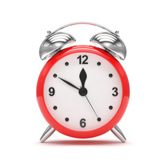 red alarm clock on white