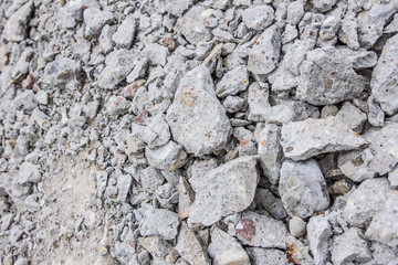 Pieces of broken rocks and bricks on the ground texture