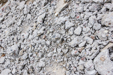 Pieces of broken rocks and bricks on the ground texture