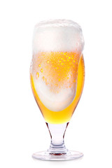 Frosty glass of light beer isolated
