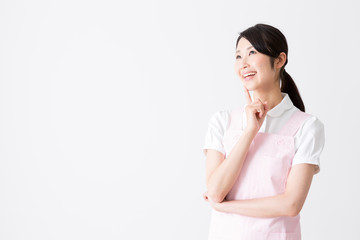 young asian care worker isolated on white background