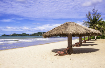 Tropical beach landscape with chairs and umbrella, Thailand