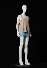 full-length mannequin female dressed in shirt and short 


