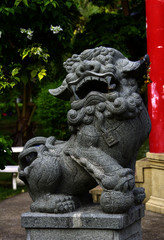 Fototapeta na wymiar China-styled stone lion near the china pavilion at Lumpini park