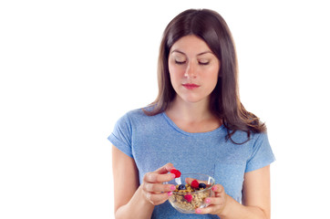 Young woman eating healthy breakfast