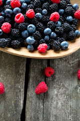 forest berres in a wooden bowl