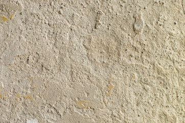 Peeling plasterwork on the cement wall