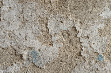 Peeling painting on the cement wall