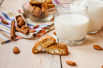 milk and cookies on wooden boards