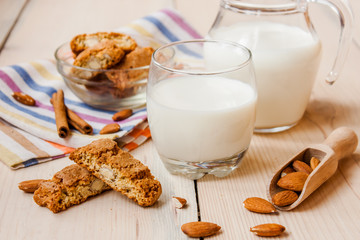 milk and cookies on wooden boards