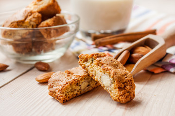 milk and cookies on wooden boards