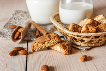 milk and cookies on wooden boards