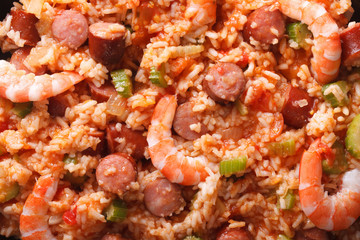 Creole food: macro jambalaya. Horizontal top view background
