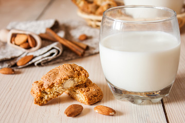 milk and cookies on wooden boards