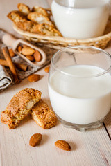 milk and cookies on wooden boards